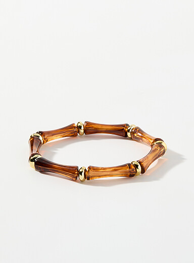 Le bracelet pierres tubulaires incurv&eacute;es