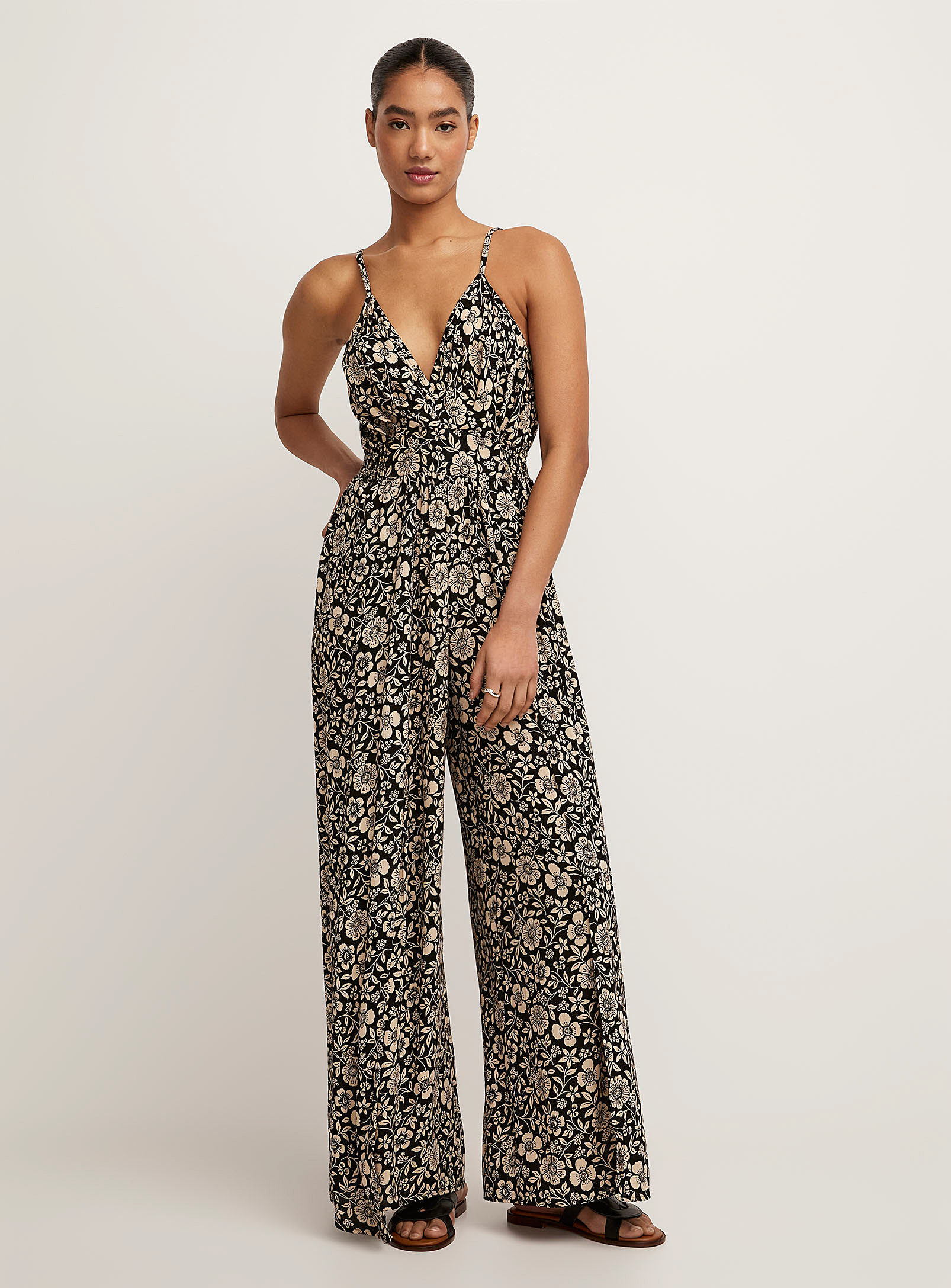 Icone Two-tone Garden Front Slit Jumpsuit In Patterned Black