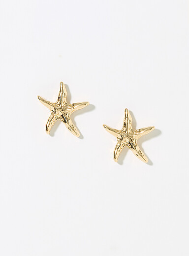 Les boucles d'oreilles &eacute;toiles de mer martel&eacute;es