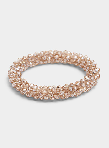 Faceted bead elastic