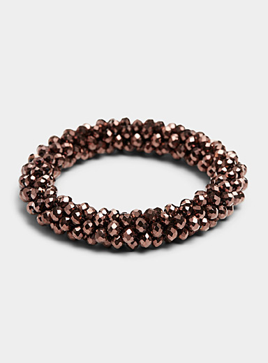 Faceted bead elastic