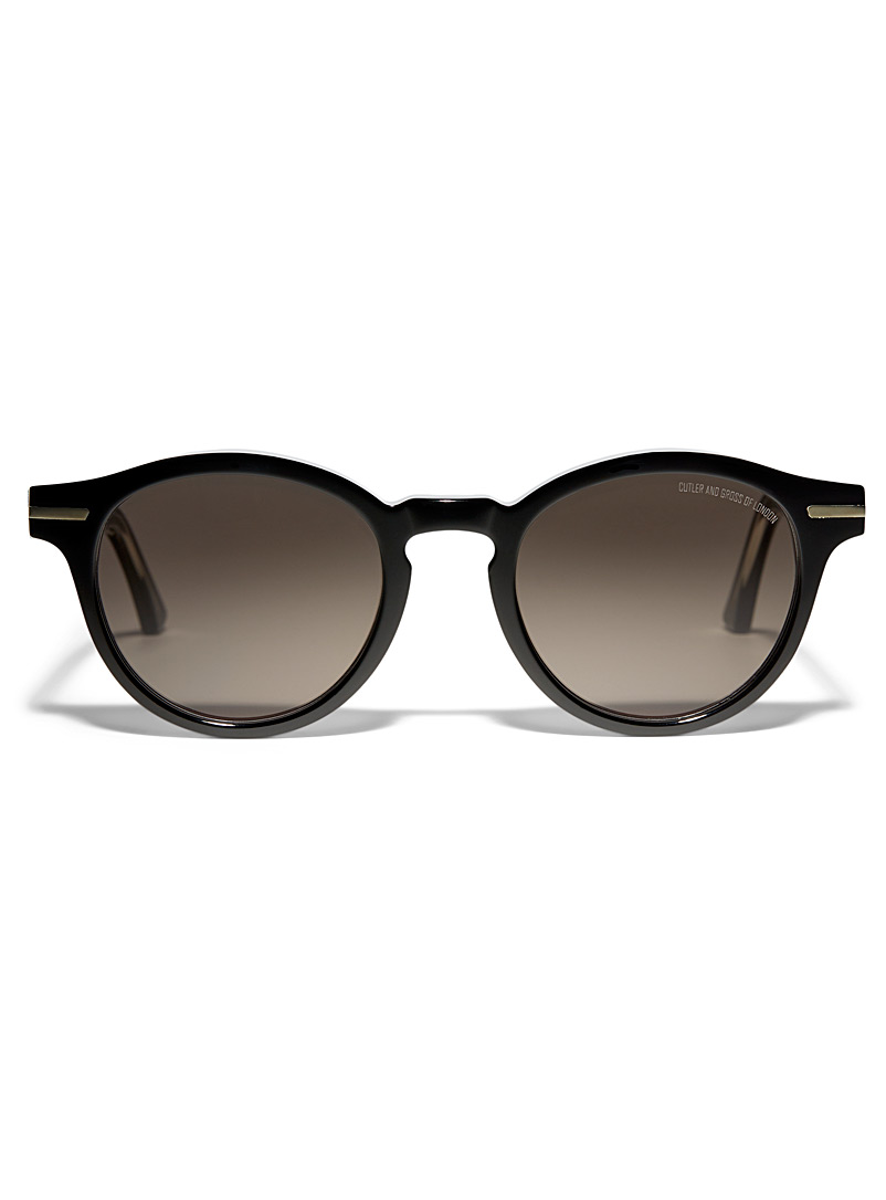 Cutler and Gross Black Round contemporary sunglasses for women