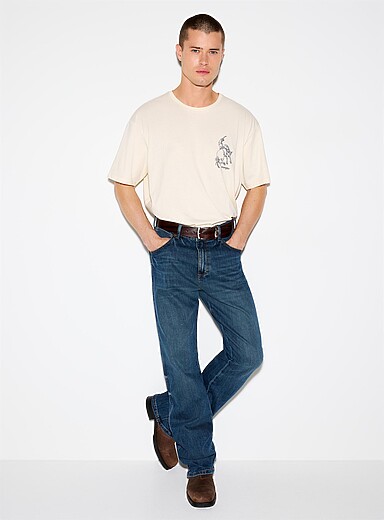 Wrangler: Le jean bleu fonc&eacute; Retro <b>Coupe semi-&eacute;vas&eacute;e</b> Bleu pour homme