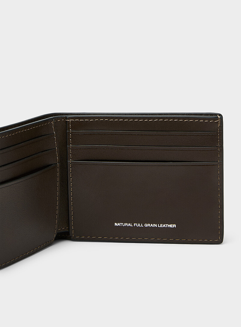 Coach: Le portefeuille mince logo emboss&eacute; Noir pour homme