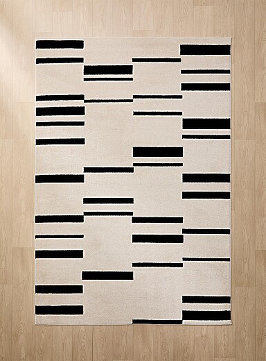 Simons Maison: Le tapis rythme en rayures Voir nos formats offerts Blanc et noir