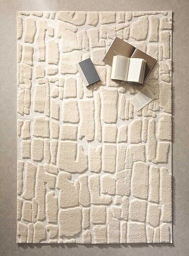 Le tapis effet pierres en relief Voir nos formats offerts
