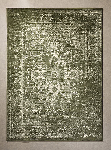 Faded patterns green rug See available sizes