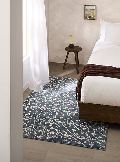 Simons Maison: Le tapis touffet&eacute; fleurs entrelac&eacute;es 120 x 180 cm Bleu &agrave; motifs