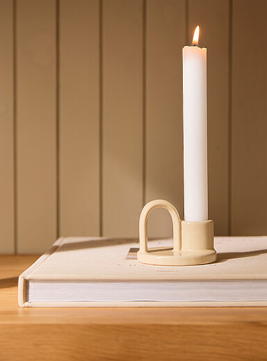Small glossy ceramic candle holder