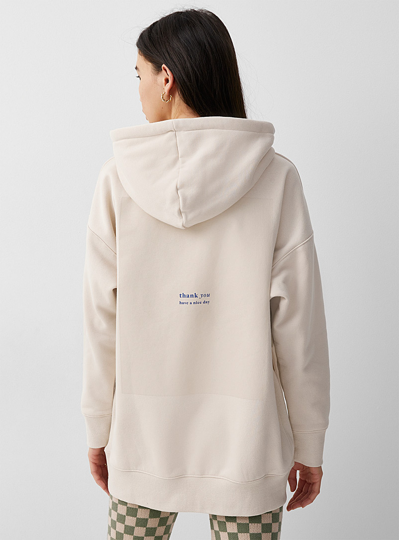 Twik Ivory White Graphic back hoodie for women