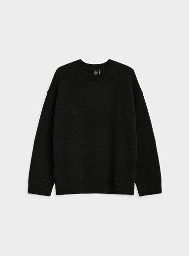 Le chandail tricot feutr&eacute; bords roulott&eacute;s