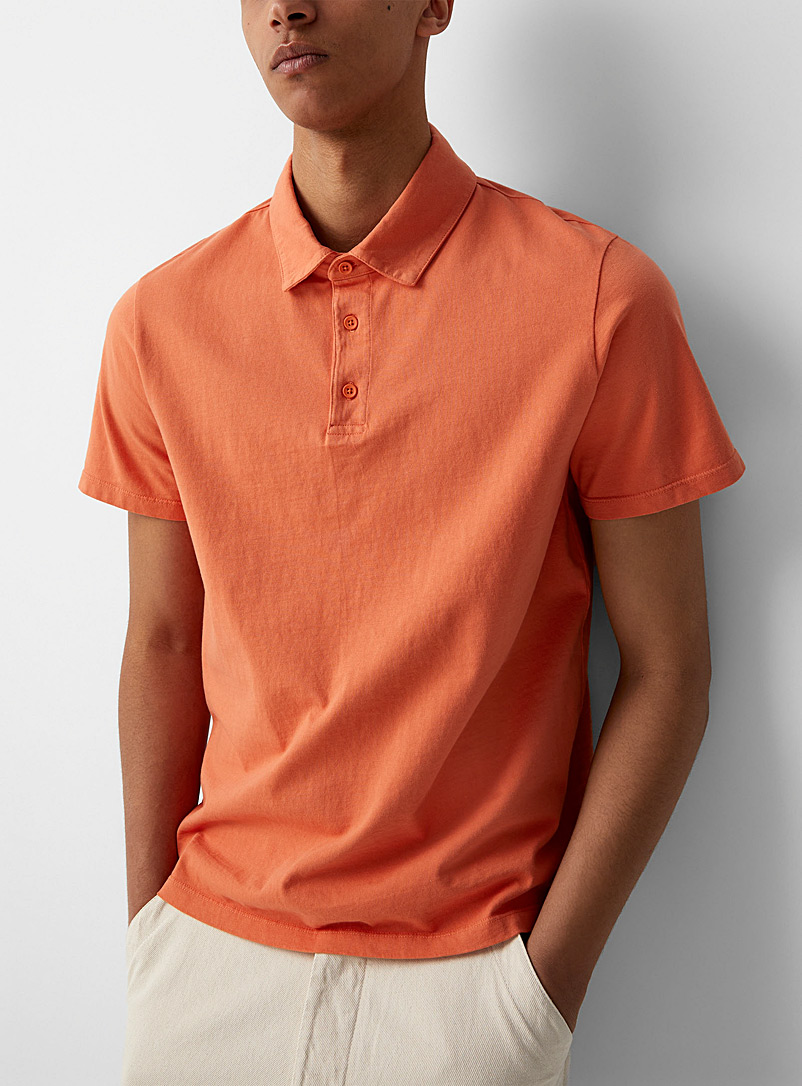 Vince: Le polo uni jersey teint Orange pâle pour homme