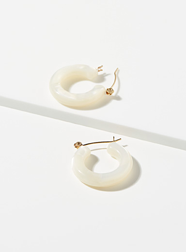Les boucles d'oreilles mouchet&eacute;es g&eacute;o