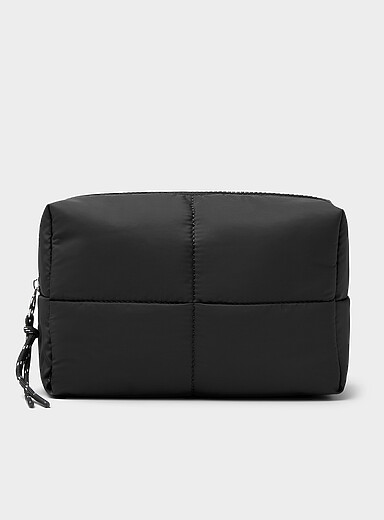 Quilted cosmetics case with bottles