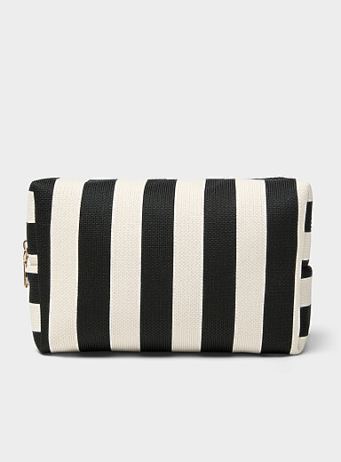 Striped cosmetics case with bottles