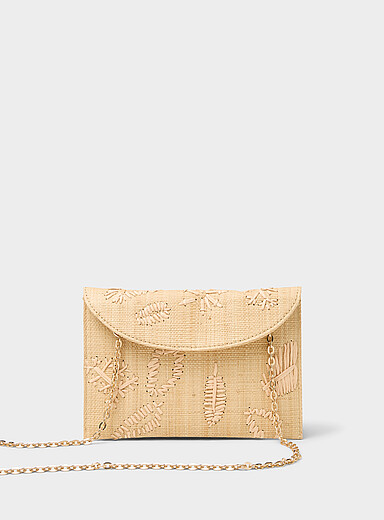 Contrasting leaves raffia clutch