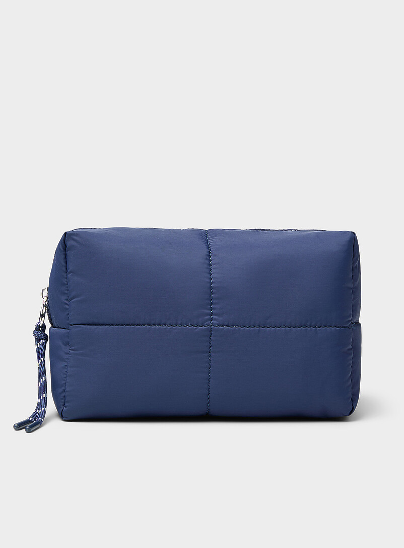 Quilted Cosmetics Case With Bottles