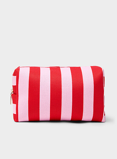 Striped cosmetics case with bottles