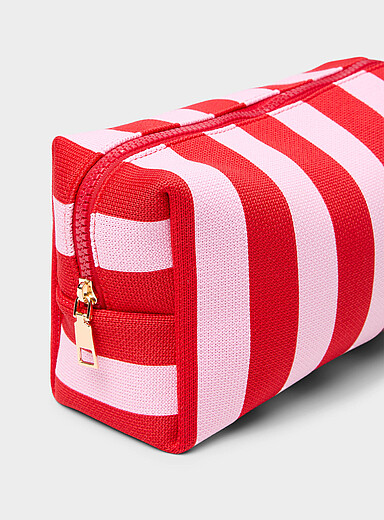 Striped cosmetics case with bottles