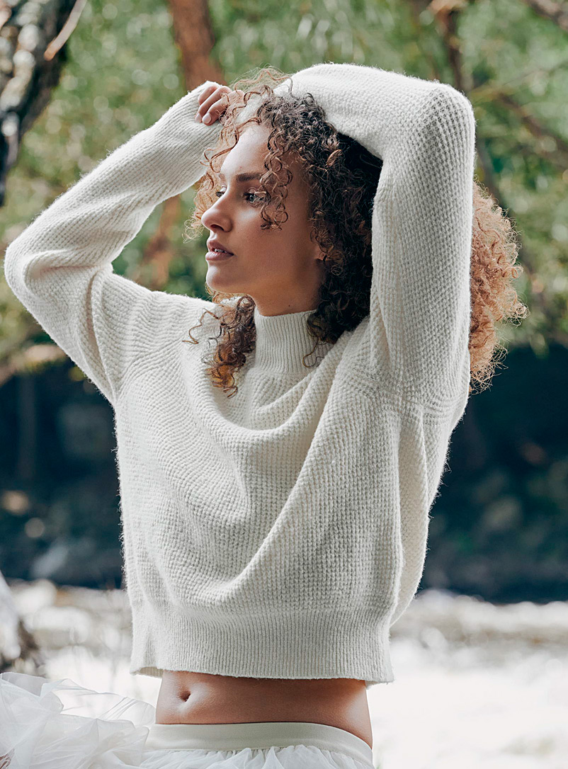 Twik White Waffled mock-neck sweater for women