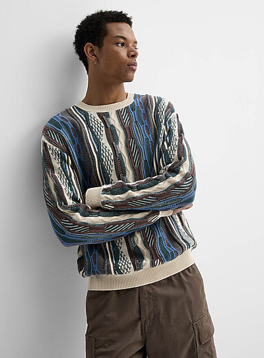Le chandail tricot mixte ample