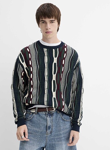 Le chandail tricot mixte ample