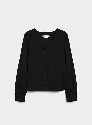 Loose lightweight ruffled crepe blouse