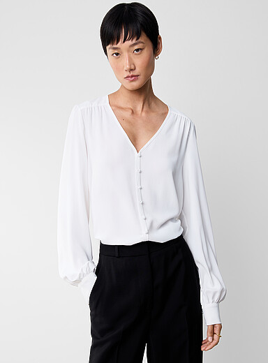 Loose lightweight ruffled crepe blouse