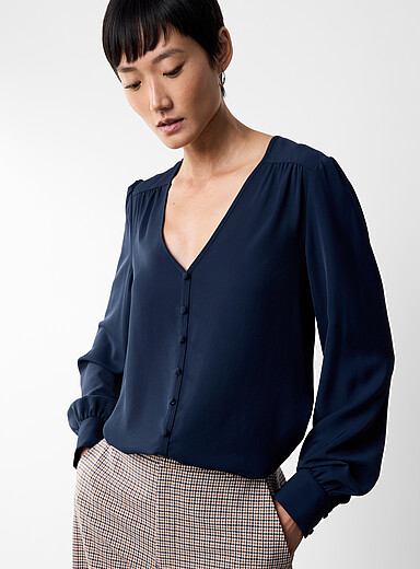 Loose lightweight ruffled crepe blouse