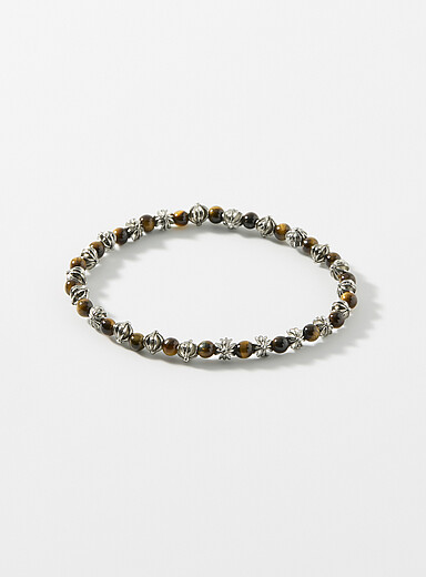 Le bracelet billes noires et croix rainur&eacute;es