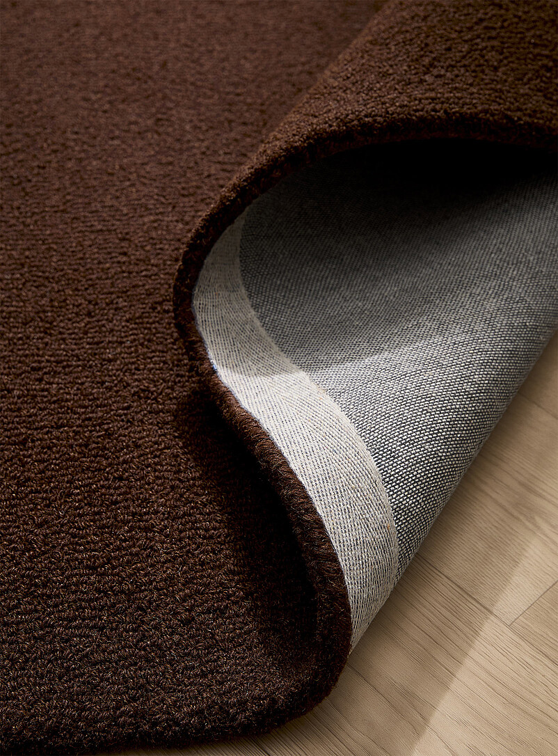 Simons Maison: Le tapis artisanal uni pure laine Voir nos formats offerts Miel - Chameau
