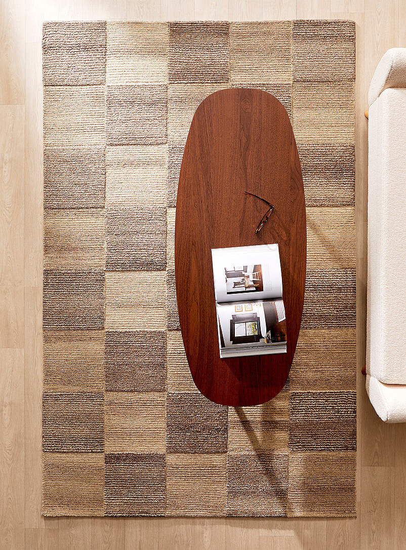 Textured checkerboard artisanal rug See available sizes product image (primary)