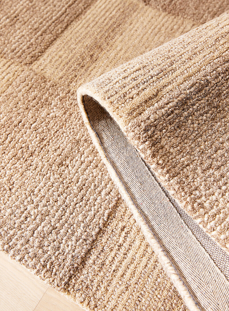 Textured checkerboard artisanal rug See available sizes product image 2