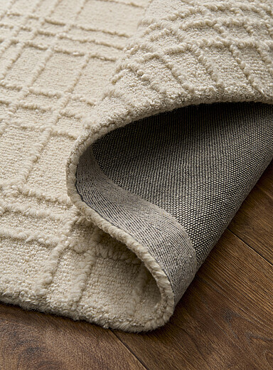 Le tapis artisanal multiquadrill&eacute; relief Voir nos formats offerts