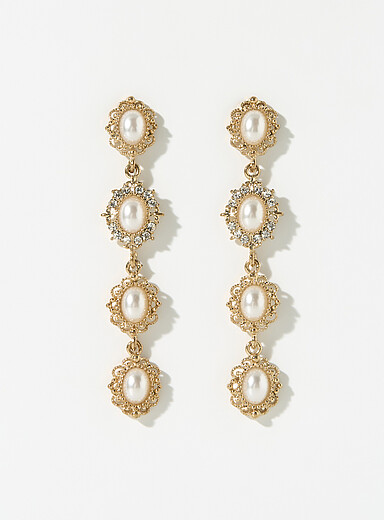 Long ornamental pearl earrings