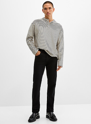 7 For All Mankind: Le jean noir Slimmy <b>Coupe droite &eacute;troite</b> Noir pour homme