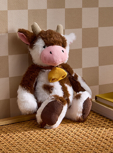La peluche vache et sa cloche
