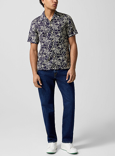 Embroidered pocket stretch tapered jean