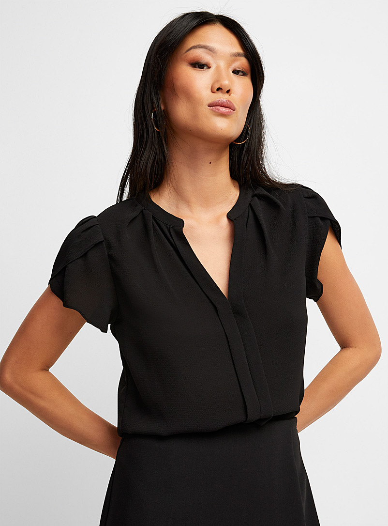 Icône: La blouse texturée col V épaules plissées Noir pour femme