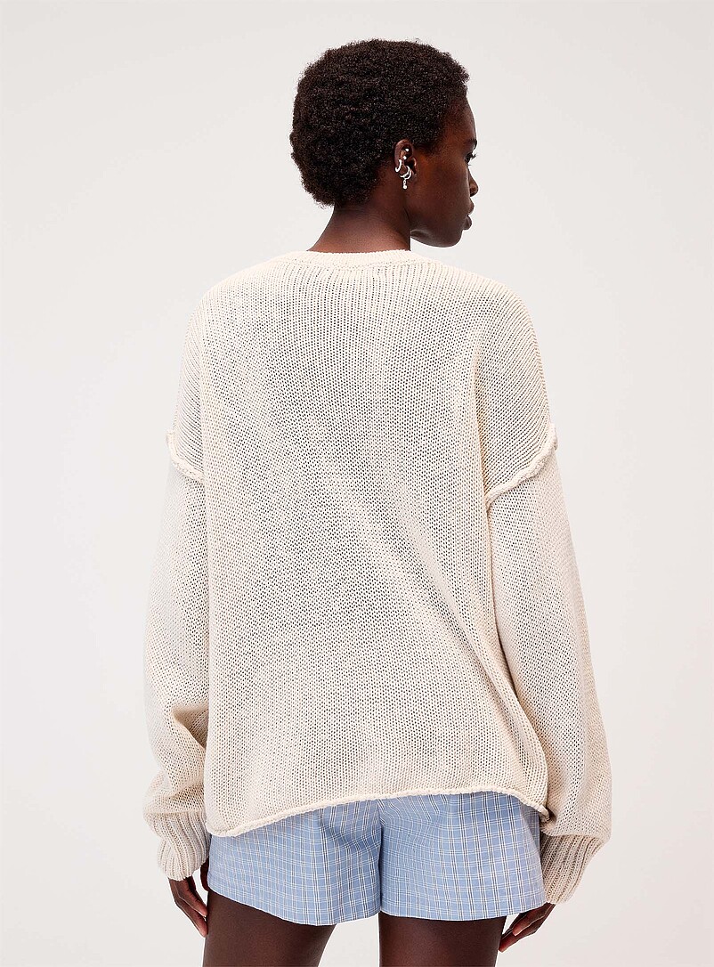 Twik: Le chandail ample coutures retourn&eacute;es Orange pour femme