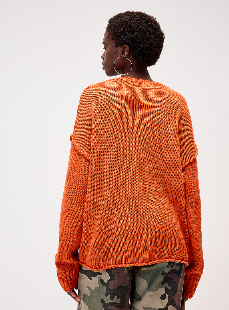 Twik Orange Reverse seams loose sweater for women