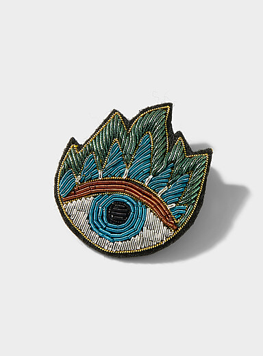 Expressive embroidered brooch