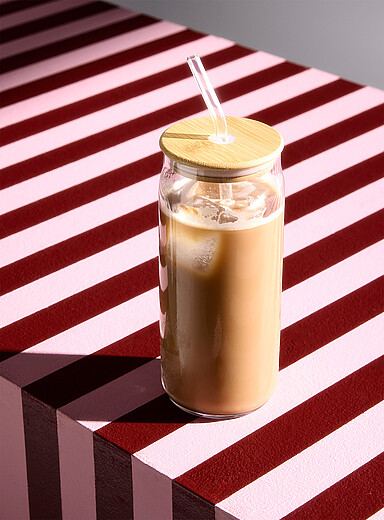 Minimalist tall glass with straw