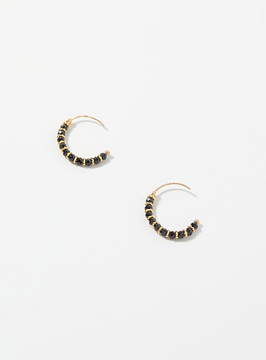 Les boucles d'oreilles Lotus