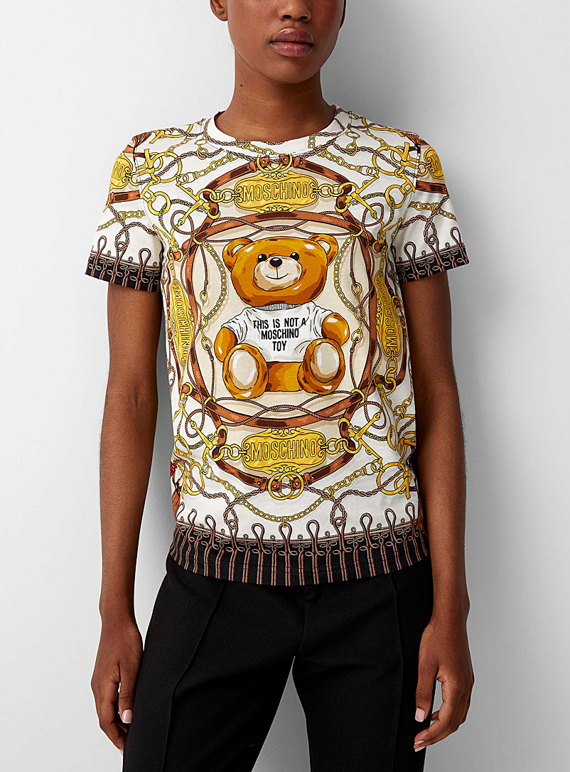 Moschino: Le t-shirt ourson or et cuir Blanc à motifs pour femme