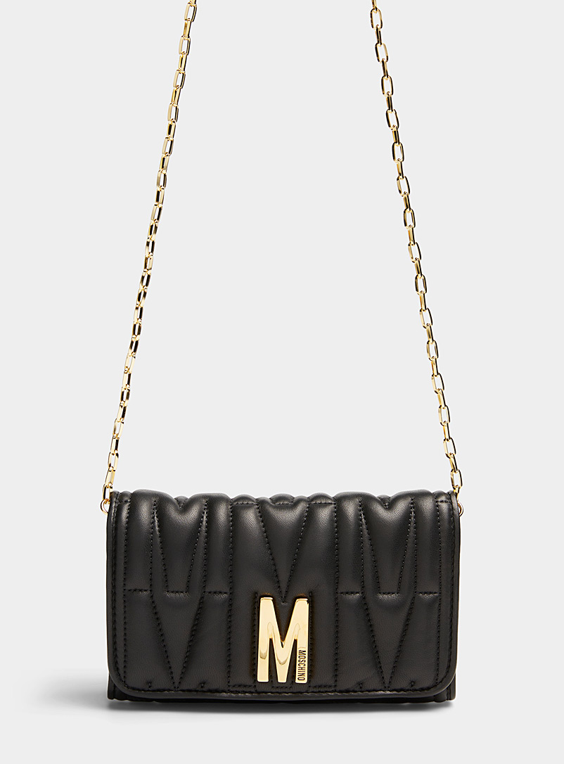 Moschino Black Quilted leather clutch for women