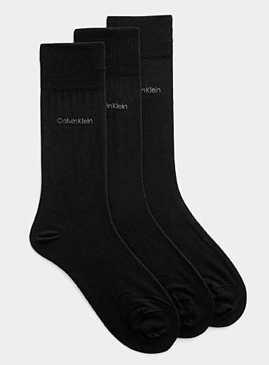 Les chaussettes habill&eacute;es unies fin tricot Emballage de 3