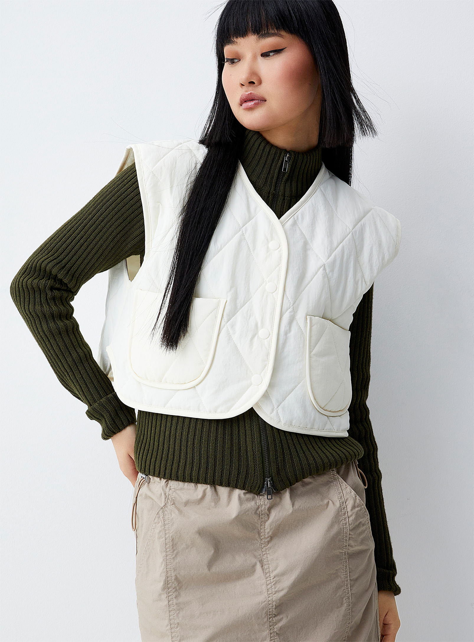 Twik Quilted Sleeveless Boxy-fit Jacket In Off White