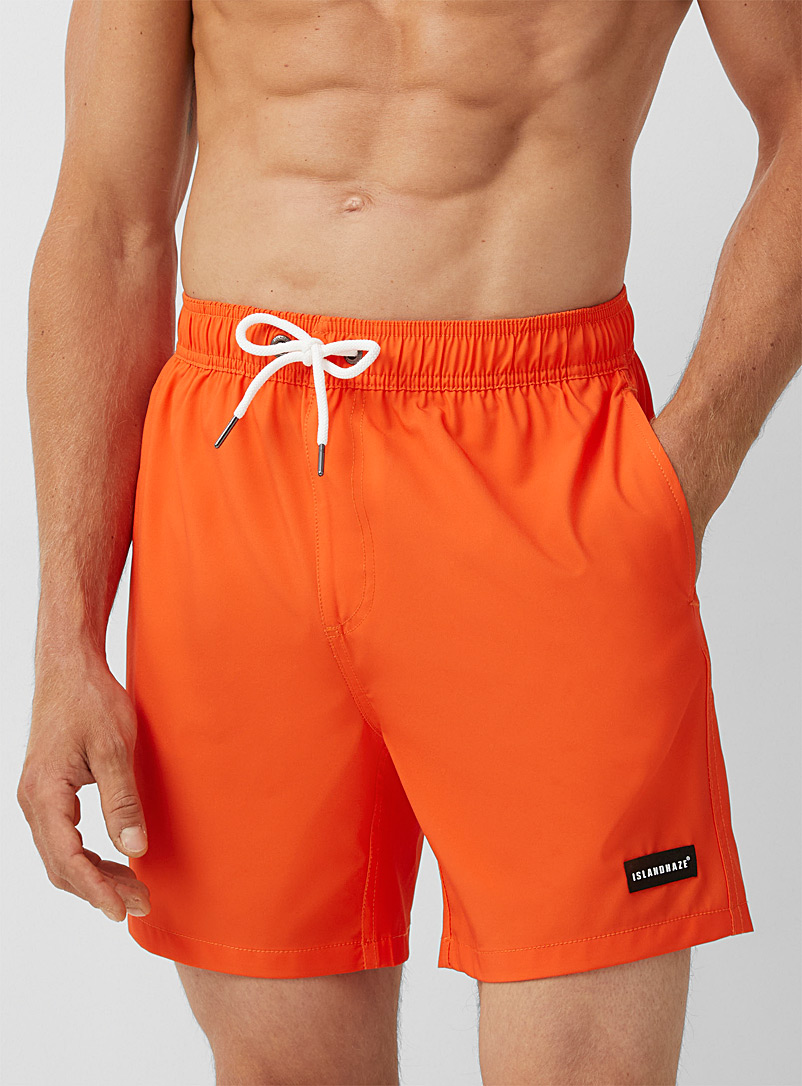 Island Haze: Le maillot short extensible couleur unie Orange pour homme