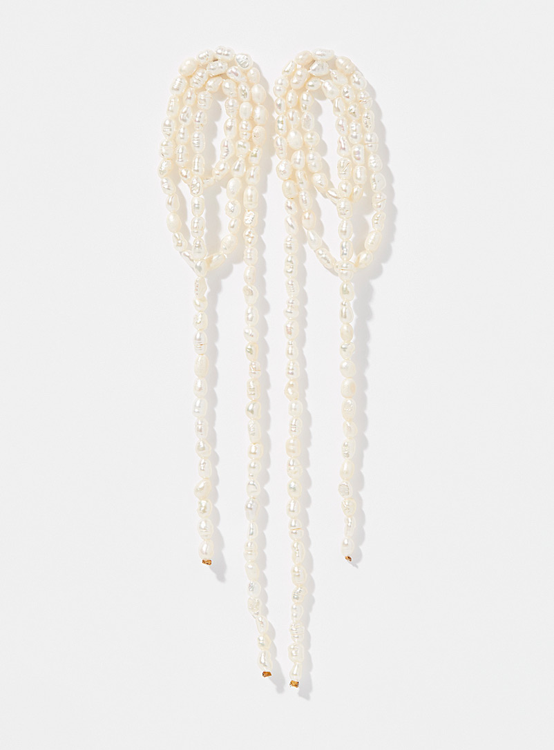 Shashi White Pearly shower earrings for women